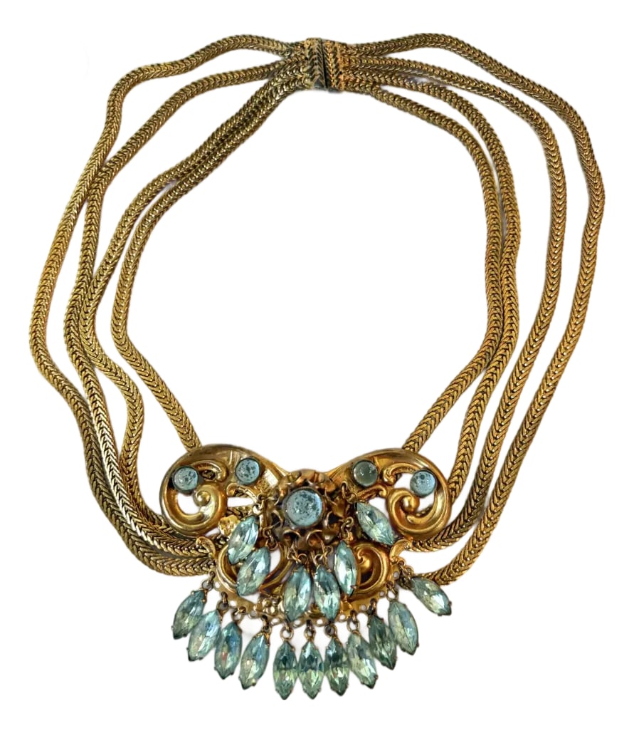 Early 20th Century Art Deco Gold Fill and Rhinestone Necklace: Stunning, antique art deco, necklace, multi strands with stunning blue and gold fill pendant. length: 16.5" Condition: Alterations: Original Condition Unaltered Imperfections: Some Imperfections