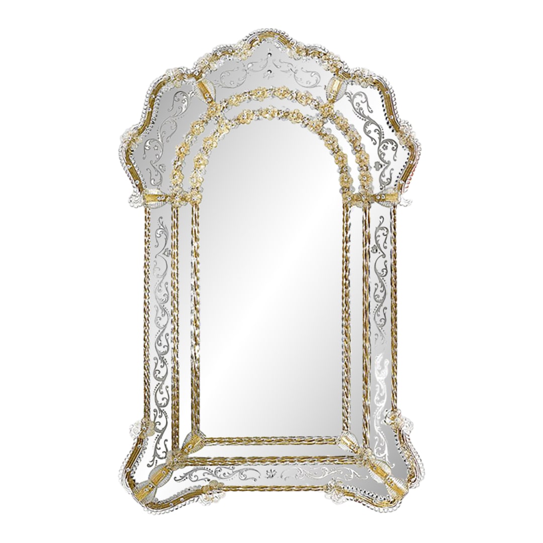 Venetian Murano Glass Wall Mirro: Handcrafted in Italy, this Venetian wall mirror features a graceful arched silhouette accented with hand-engraved detailing and decorative Murano glass elements. Intricate floral and scroll motifs
