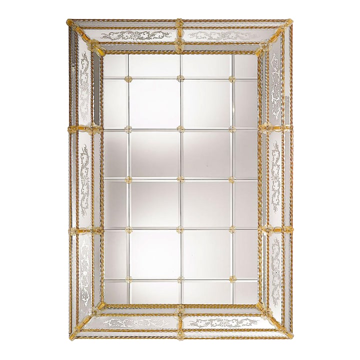 Hand-Engraved Venetian Mirror With Amber Murano Glass: Handcrafted in Italy, this Venetian wall mirror features hand-engraved mirrored panels accented by decorative amber Murano glass elements. Intricate floral and scroll designs are etched throughout