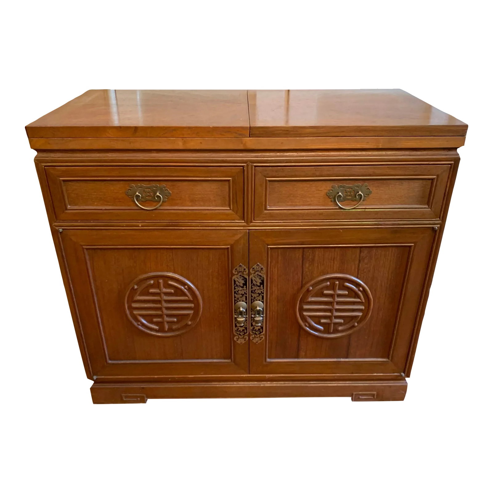 1960s Chinese Bar Cart: 1960s Vintage Chinese bar cart. The cart is solid wood with brass details. Two folding leaf extensions with a stone top. There are two drawers and an adjustable shelf in the interior. 36W x 18D x