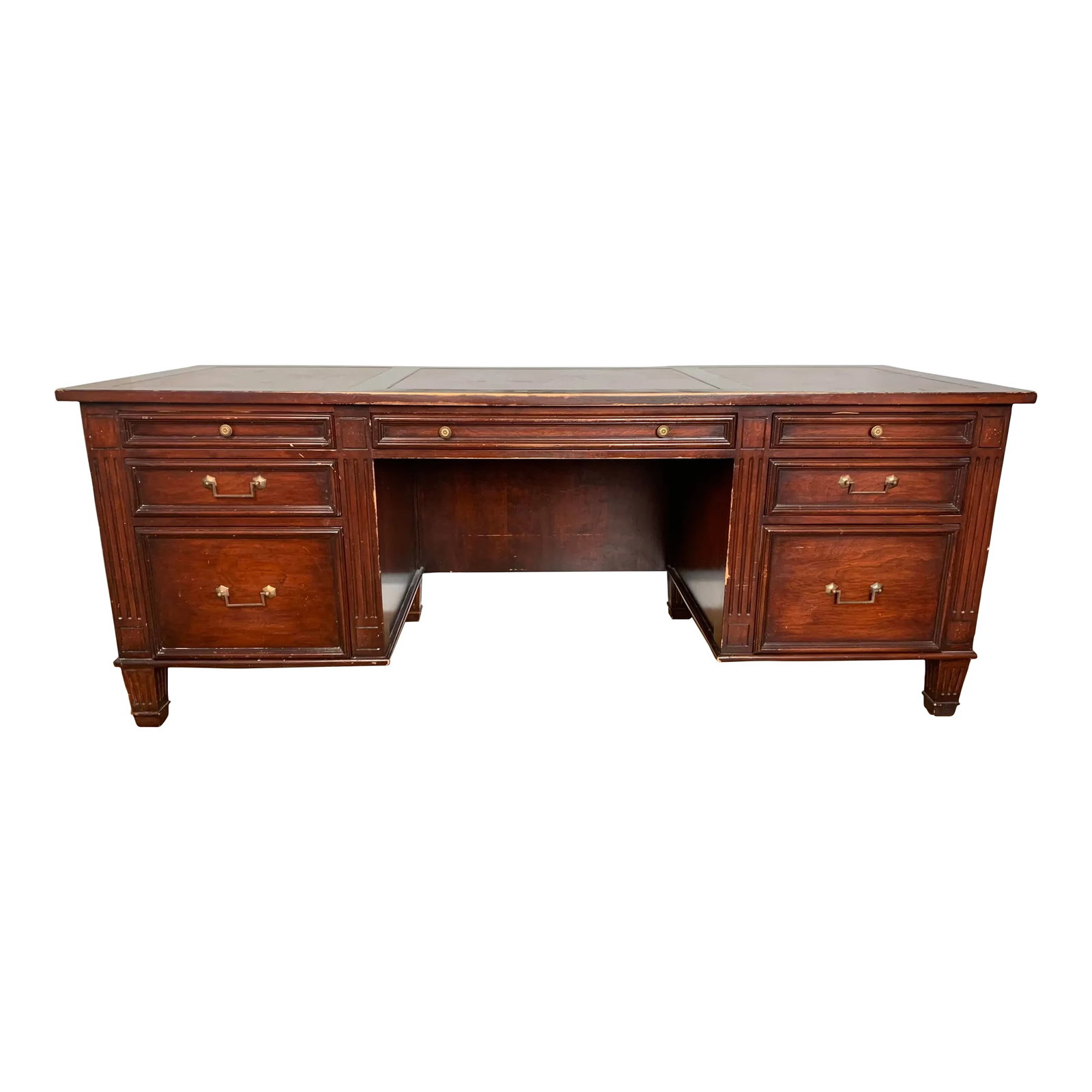 1990s Leather Top Executive Writing Desk: Leather Top Executive Writing wood desk. After the film 'Dances With Wolves' Kevin Costner had this desk custom built for his office at Warner Brothers TIG productions. Condition: Alterations: