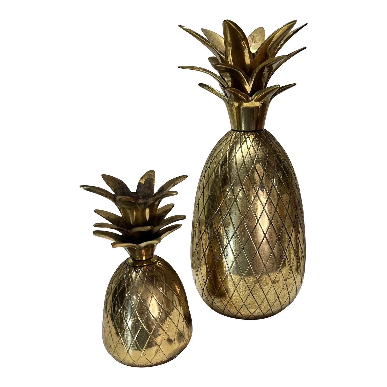 Vintage Brass Pineapple Candleholders - a Pair: Pair of vintage brass pineapple candleholders. Large measures 3.5" diameter x 8.5" h, small measures 2" diameter x 4.5" h. Made in India. Condition: Alterations: Original Condition Unaltered