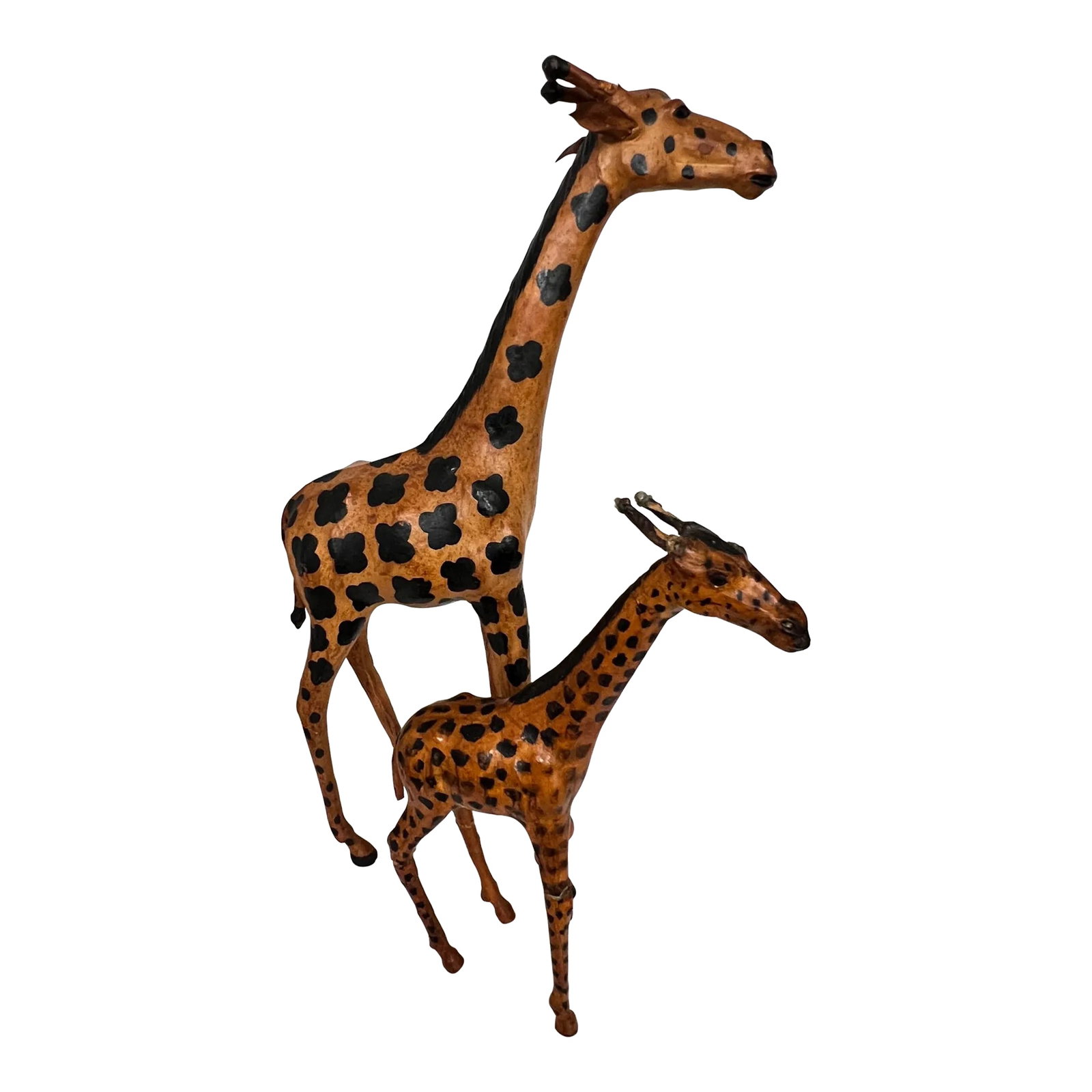 Leather Hand Tooled Giraffe's Adult and Juvenile - Set of 2: Leather hand tooled giraffe adult and juvenile. Adult 17" w x 5" d x 28" h, 13" w x 4" w x 18" h. Marked made in India. Condition: Alterations: Original Condition Unaltered Imperfections: Some