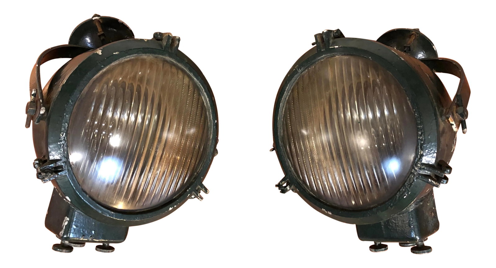 Vintage Ship's Lights - Large Spotlights - a Pair: Pair of dark green, heavy duty ship's spotlights or search lights. They still have their mounting and adjusting hardware and they swivel. They would make very cool outdoor lighting around the house,