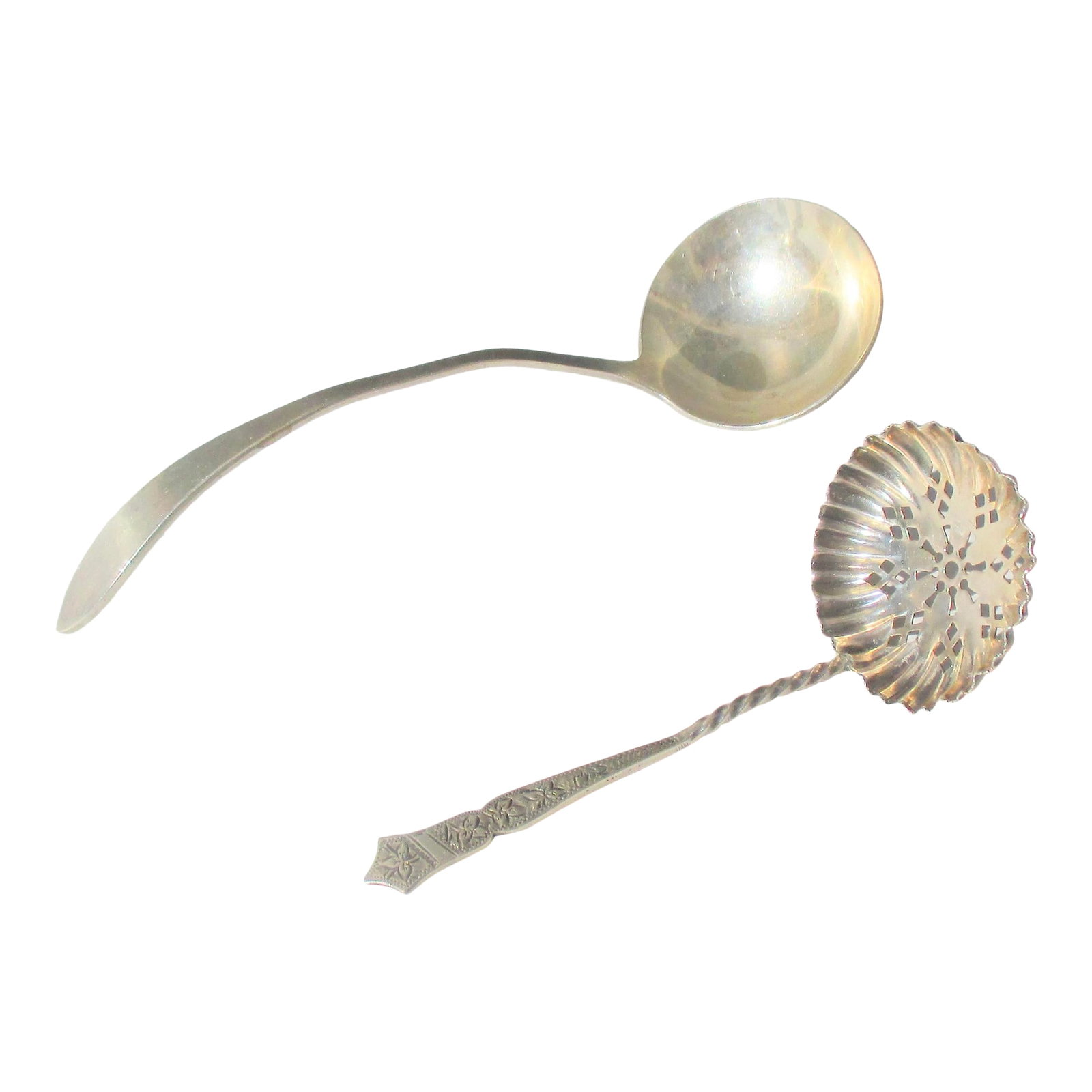 Sterling Silver Serving Laddles -A Pair of 2: A pair of small serving laddles 19th century. One small pierced laddle marked 1878, and the other marked Amston with a deep spoon bowl. The measurements are 5" long and 3.75" long, a pair of delicate