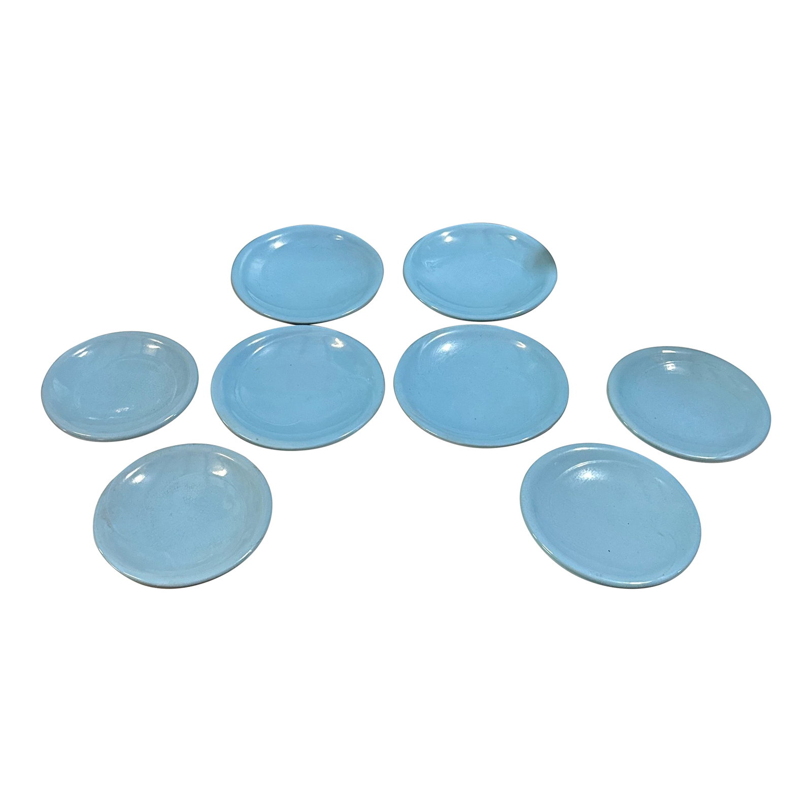 1970s Collection of Blue Ceramic Plates- Set of 8: Up for consideration is a beautiful collection of blue ceramic plates. These would look lovely on display in your home and they are a great find for the interior design enthusiast. Please check out