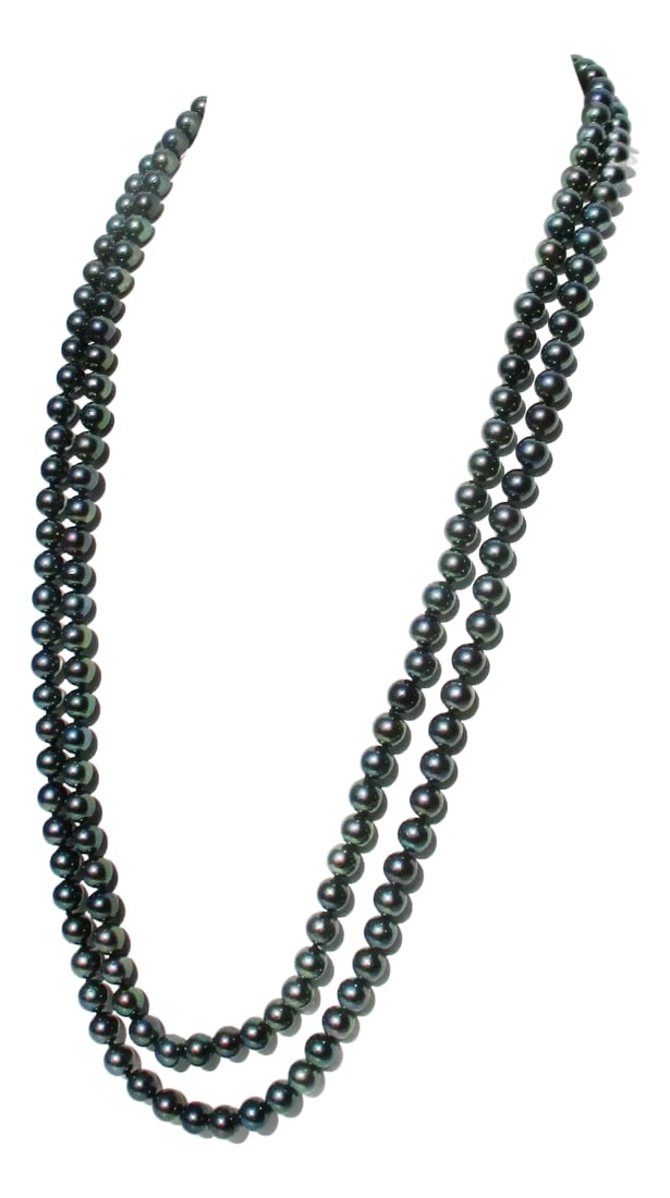 Double Strand Tahitian Iridescent Pearl Necklace: Tahitian Iridescent Pearl strands with a signed clasp KF 750. 18 kt yellow gold. One - Inner strand 24" strand measures 25" long and the beads are 7mm . Blemish free pearls. South Sea Pearls. Circa