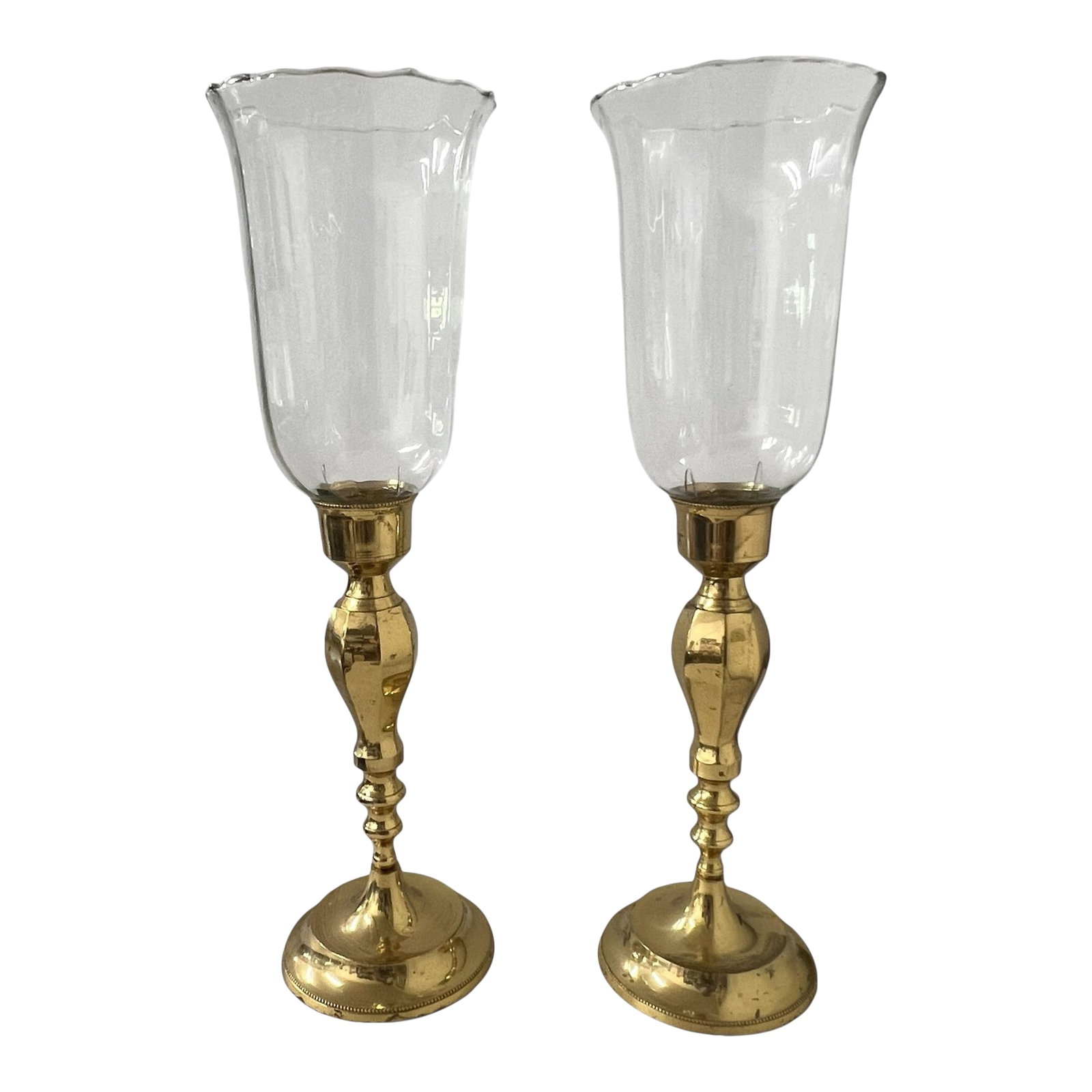 Vintage Brass Hurricane Globe Candleholders- A Pair: Vintage brass candleholders with hurricane globes. Globes have scalloped edges. Measures with globe 6.25" diameter x 20.5" h, candle stick alone 5.5" diameter x 12.5", globe alone 6.25" diameter x 8"