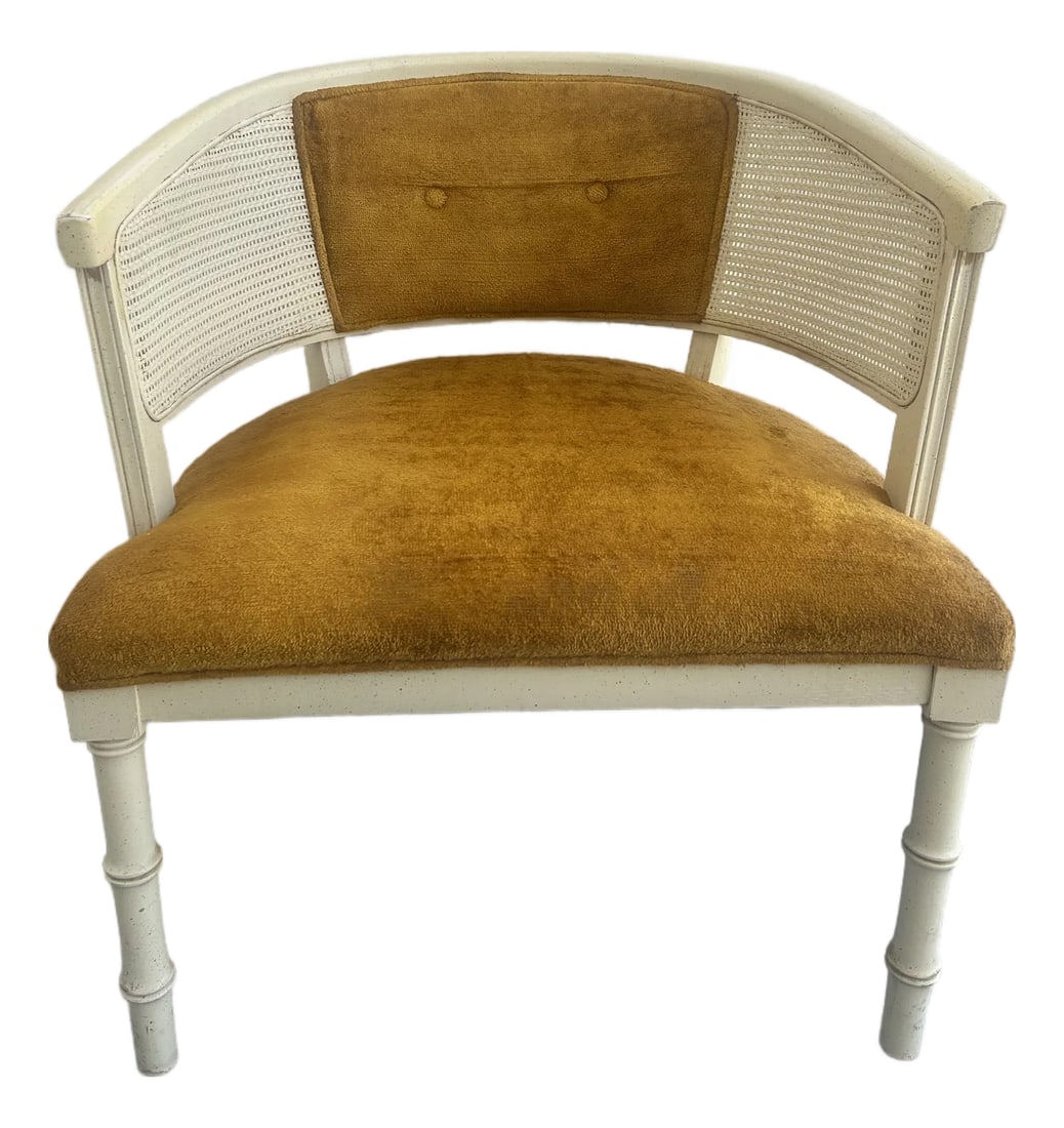 1960s Faux Bamboo and Cane Single Lounge Chair: Faux Bamboo and Cane barrel chair lounge chair in original vintage condition. Perfect for that coastal look neutral color Condition: Alterations: Original Condition Unaltered Imperfections: Some
