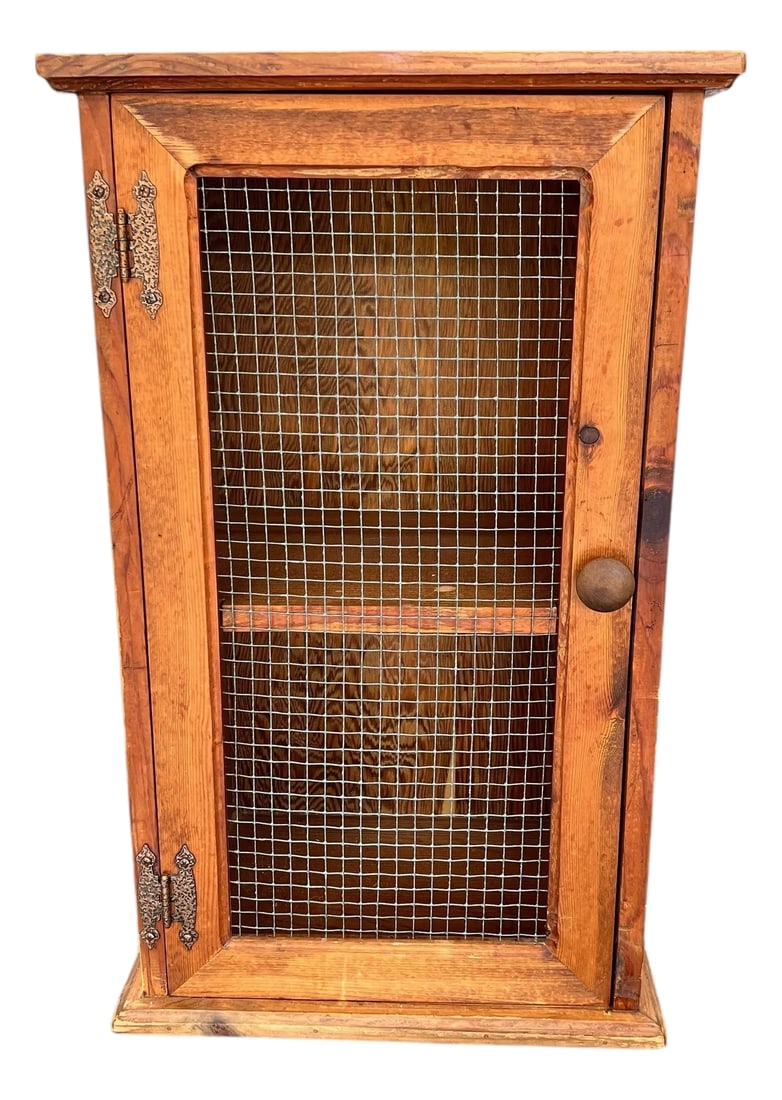 Mid Century Natural Wood Knotty Pine Cabinet, Wire Door Panel, Farmhouse, Cabin, Lodge, Rustic, Folk: Mid century natural wood (no finish) knotty pine cabinet. One door with wire panel. Interior has two shelves. Measures 16.5"w x 12" d x 27" h. Shelves 10.5" d x 13" w, top 13" h, bottom 11"h.