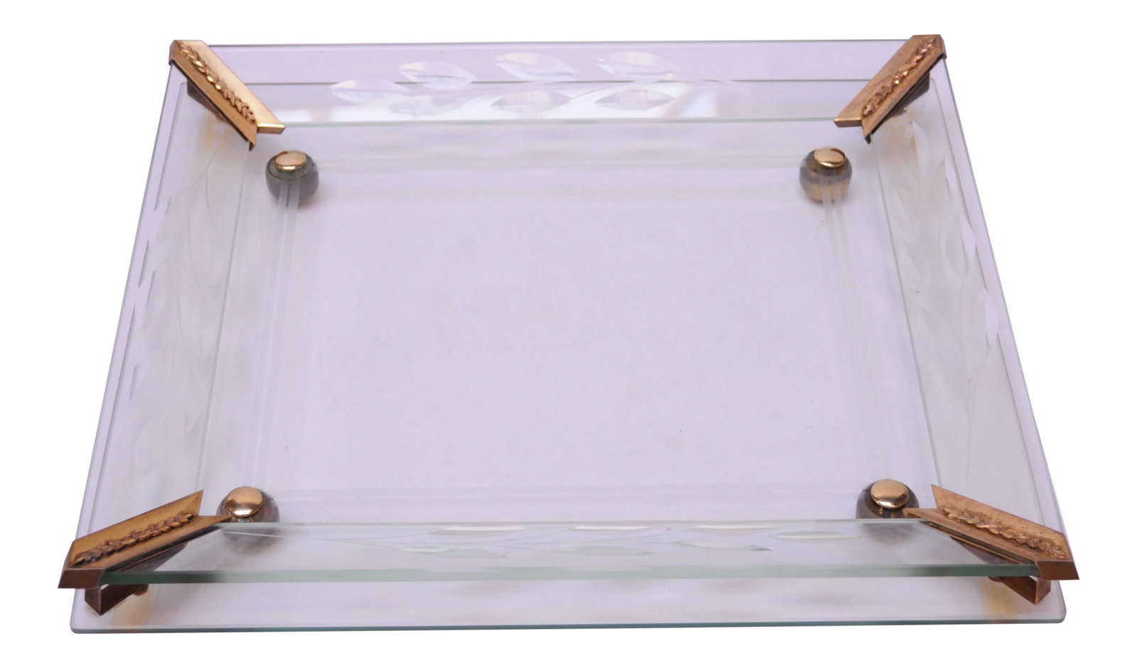 Mid-20th Century Etched and Beveled Glass Vanity Tray: Circa 1950s deeply etched and bevelled mirrored vanity tray composed of two panels of glass separated by brass brackets, all supported by brass "ball" feet. Very good, vintage condition with slight