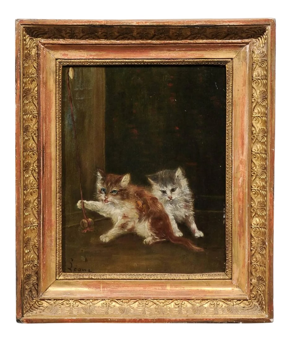 Late 19th Century Victorian Style Oil Painting of Kittens, Framed: A French oil on canvas animal painting signed Laroche from the late 19th century with giltwood frame. This French oil on canvas painting features two lovely kittens playing with a stringed cork.