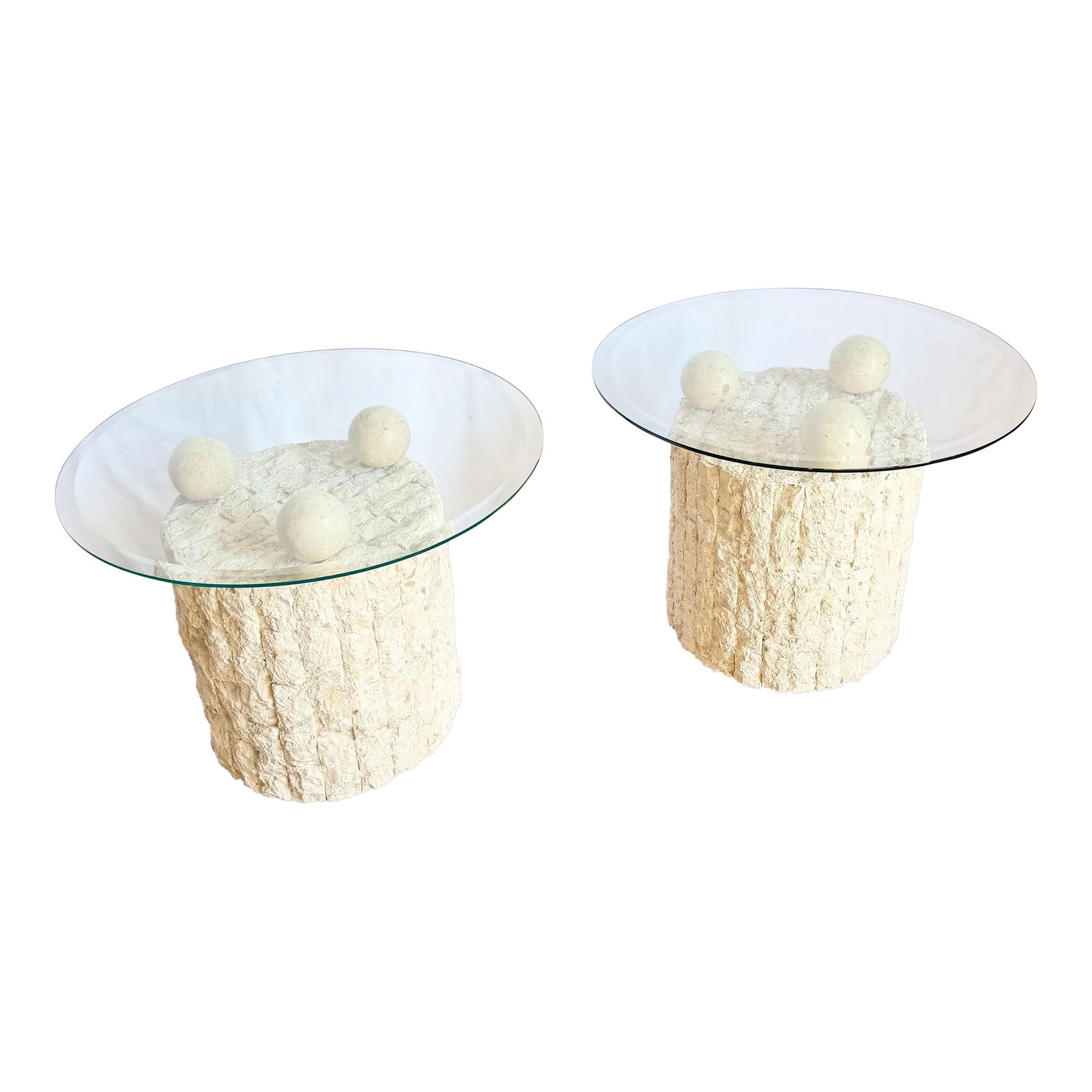 Postmodern Circular Tessellated Stone Glass Top Side Tables - A Pair: This striking pair of postmodern side tables features cylindrical tessellated stone bases topped with floating circular glass surfaces. The sculptural stone bases display a richly textured, hand-set p