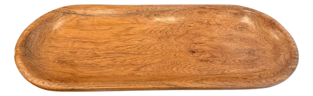 Andrianna Shamaris Oval Teak Wood Platter: Minimalist shallow platter hand carved from a single piece of aged teak wood and finished with a natural oil revealing the beautiful wood grain. Own an Andrianna Shamaris original. Condition: