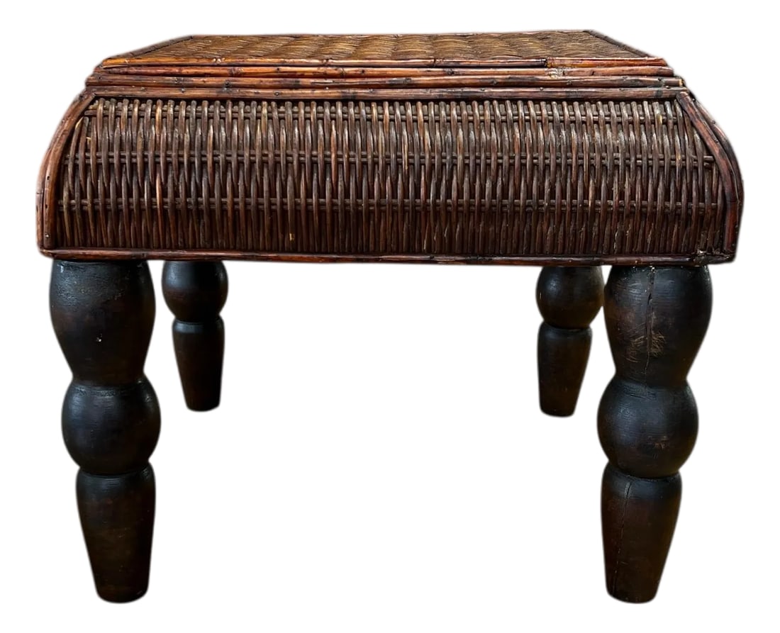 Vintage Bamboo and Woven Rattan British Colonial Style Footstool: British colonial style burnt bamboo and woven rattan footstool with dark turned legs. Some imperfections and minor repairs consistent with age and use. See pictures using zoom feature. Measures 15" w