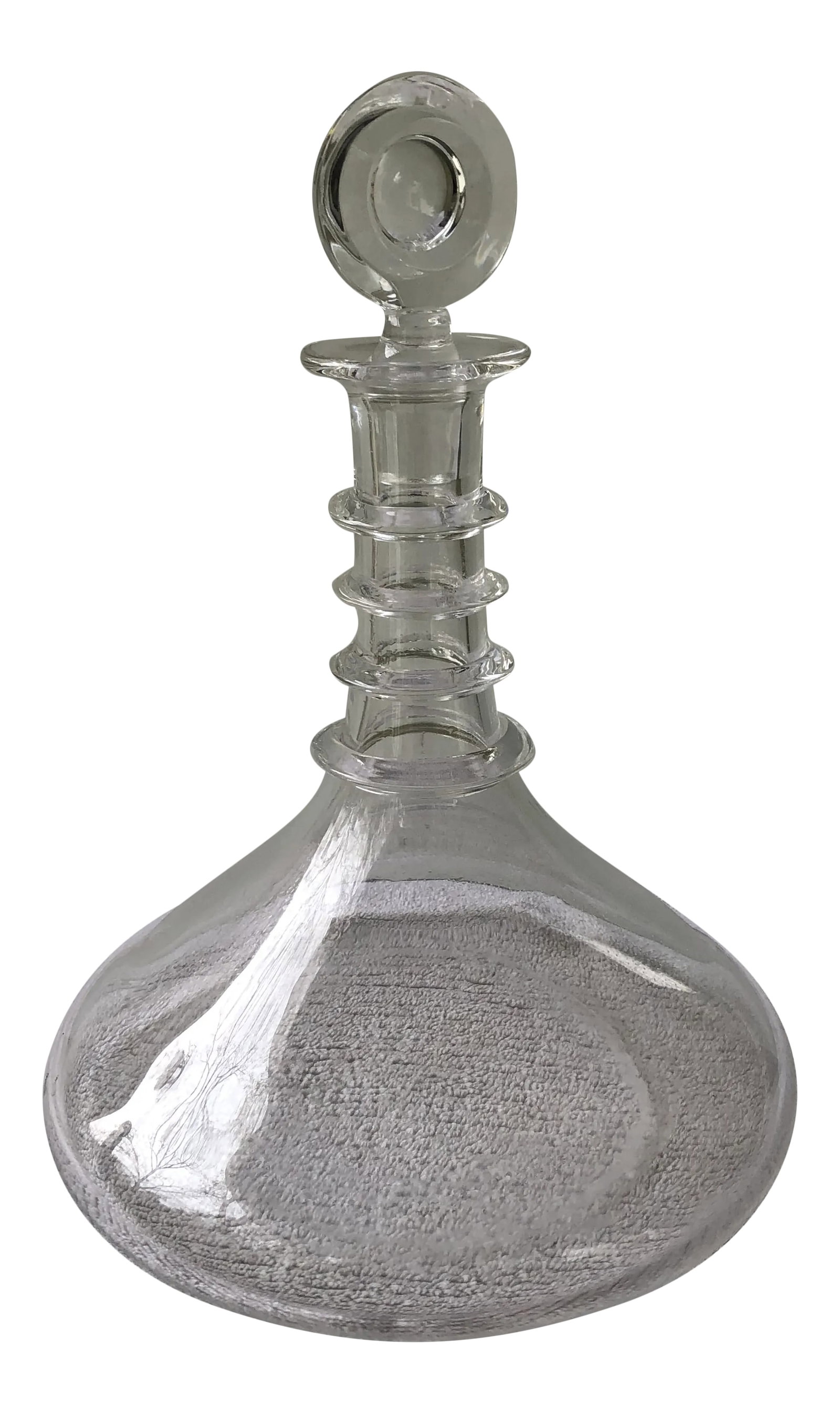 Vintage Glass Ship's Flat Bottom Decanter: Vintage glass decanter and stopper with flat bottom. These flat bottom decanters were designed for use on ships. Their flat bottom prevented them from turning over in rough weather. Condition:
