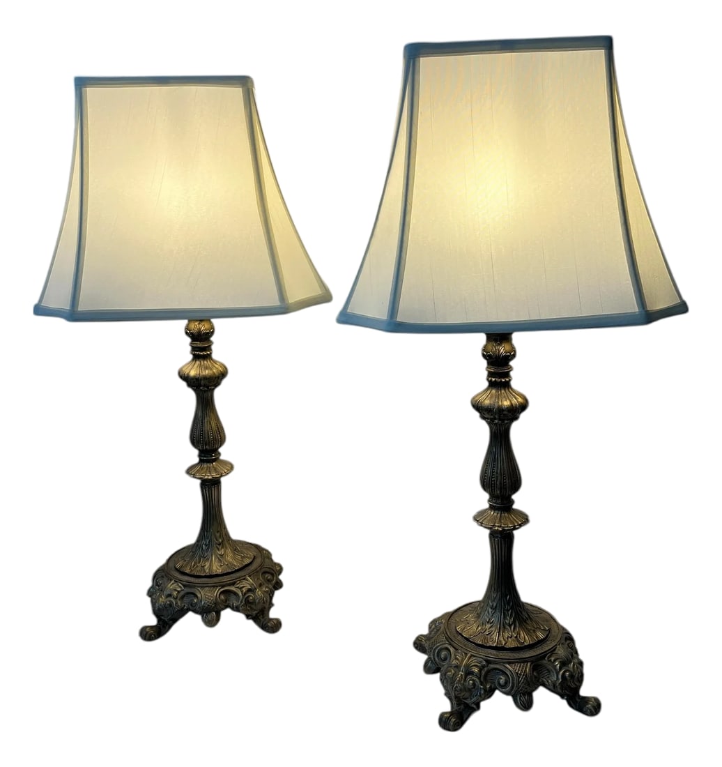 Mid 20th Century Gilt Metal Footed Baroque Style Lamps and Shades - A Pair: Mid century gilt footed baroque style table lamps. Rectangular cream color shades are included. Lamp mrasured 7.5" square, x 29" h. Shade measures bottiom 14.5" w x 10" d, 8" w x 5" d x 11" tall. 3 wa