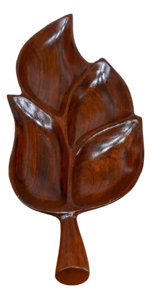 Serving Tray With Shape of Leaf in Rosewood, Unknown, 1960s: Handcrafted from noble wood, the serving platter features smooth curves and delicate woodwork emulating a tropical leaf from the Amazon. The noblewood has rich tones with stunning natural wood grain o