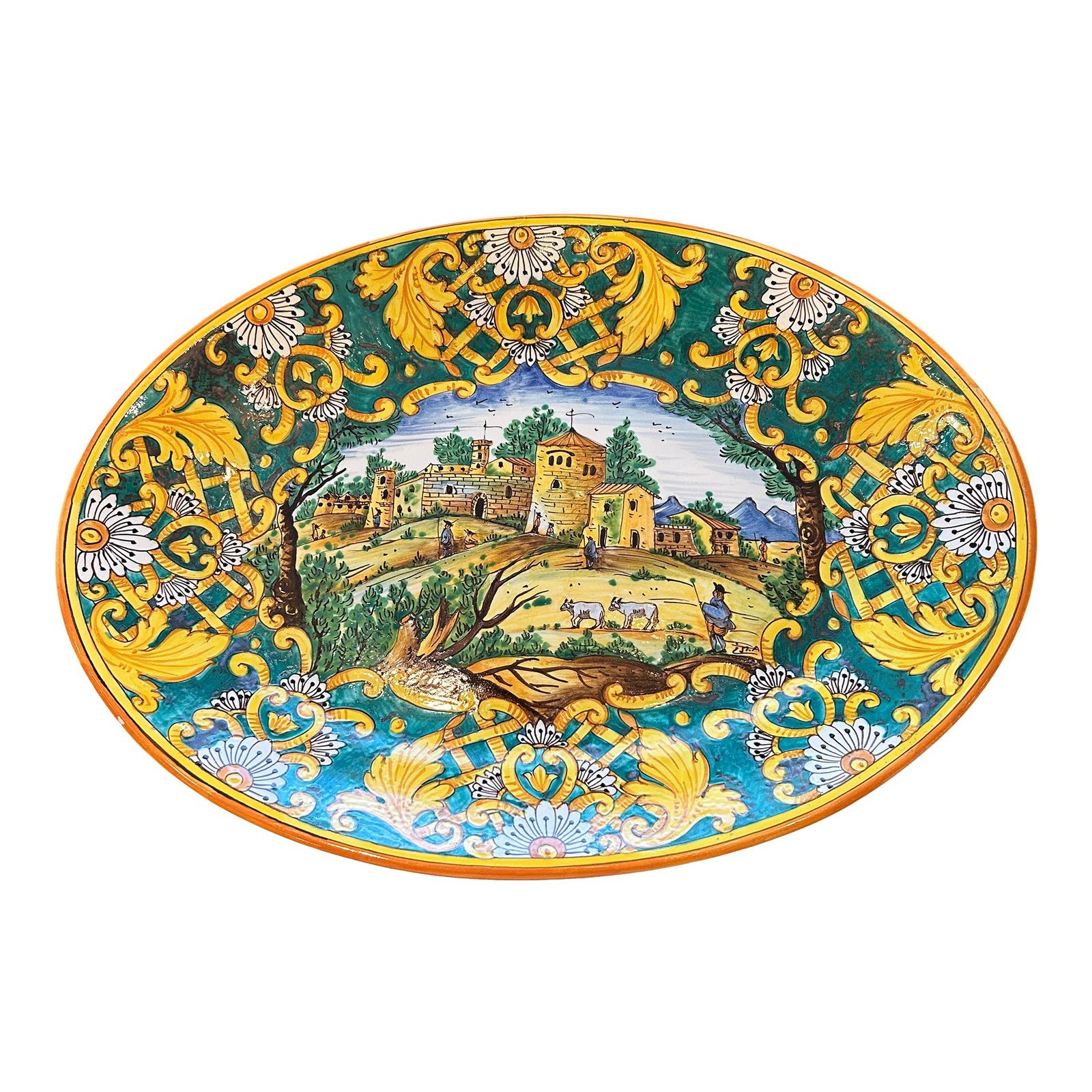 1950s Large Oval Italian Giacomini Ceramic Platter Wall Art: Beautiful classic Italian glazed pottery large oval platter with yellow blue and green landscape having marvelous details. The back has the maker's label, Giacomini, and is wired if hanging it as
