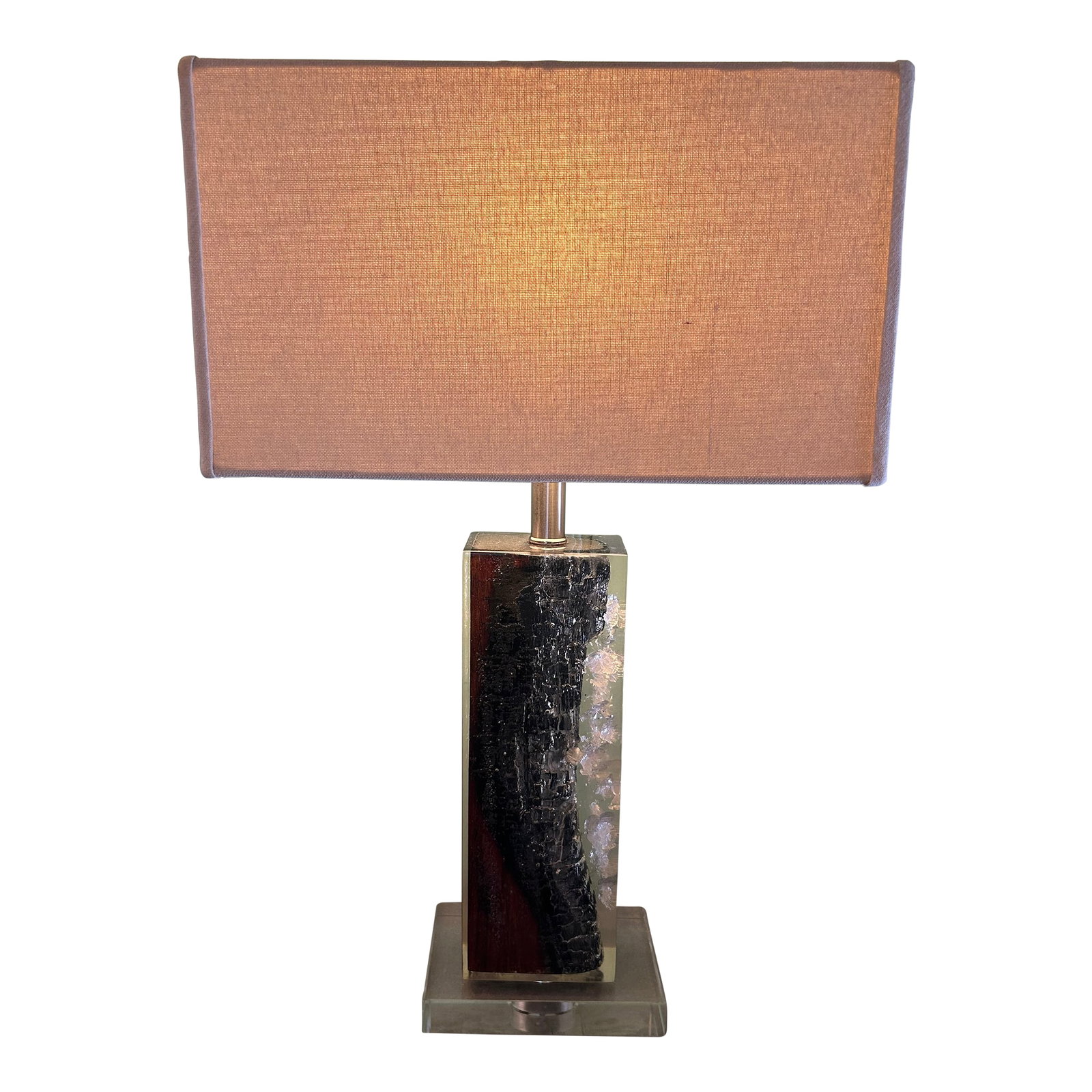 Lucite and Petrified Wood Table Lamps by Made Goods -a Pair: Glamorous pair of organic modern columnar table lamps having what we believe is earthly grey and rust glistening petrified wood encased in lucite bases with rectangular contemporary shades. Base is 7"