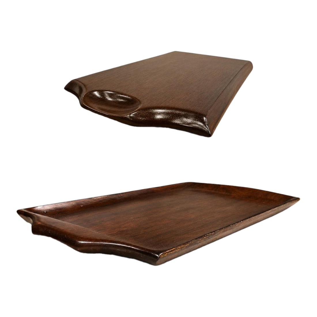 1960s Brazilian Modern Serving Tray in JacarandÃ¡, by Jean Gillon for WoodArt: Designed by Jean Gillon for WoodArt and produced in Brazil during the 1960s, this serving tray exemplifies the designer's ability to reconcile sculptural restraint with material richness. Conceived