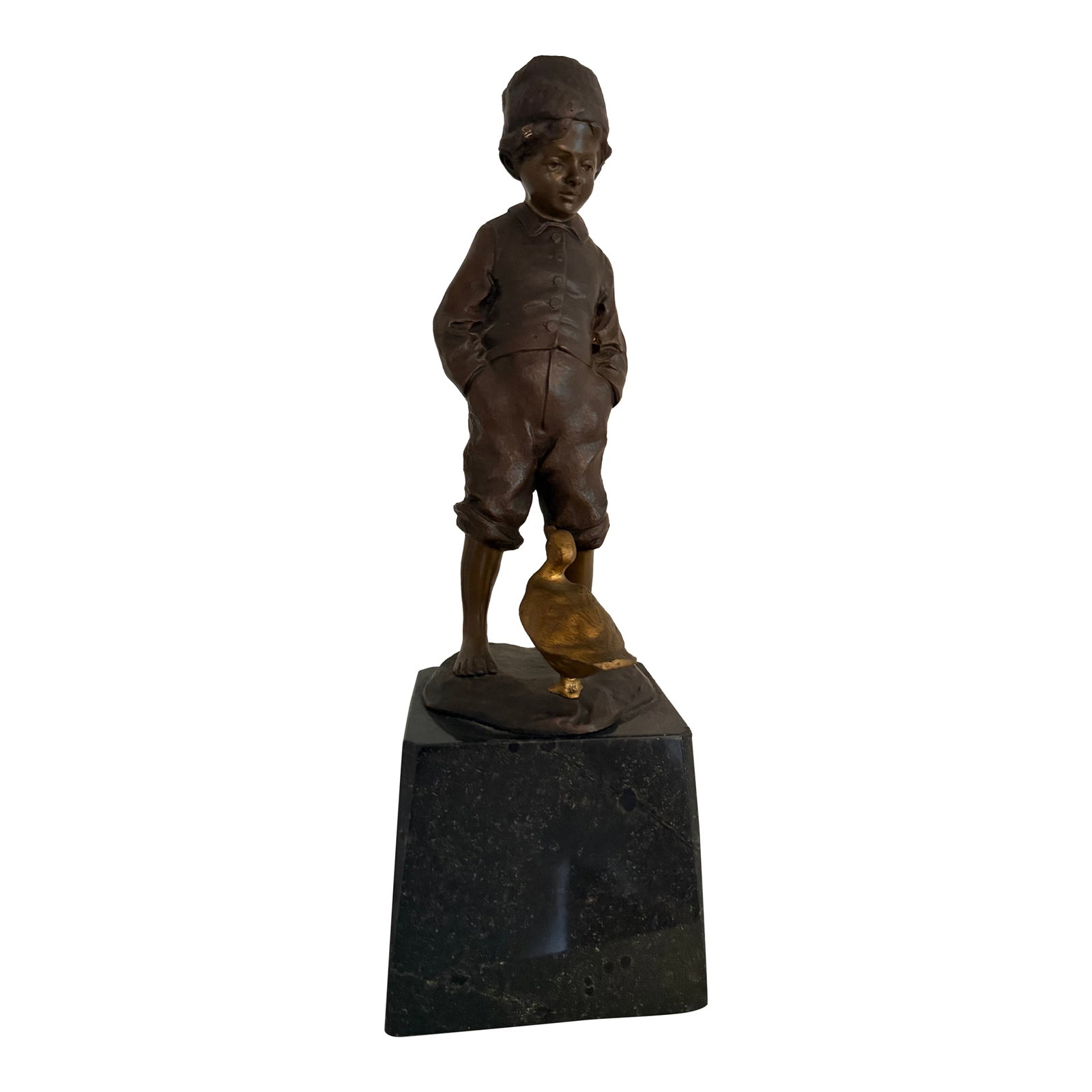 Late 19th Century, Julius Paul Schmidt-Felling, "Goose Boy" Bronze Sculpture: Charming bronze sculpture by late 19th century German sculptor Julius Paul Schmidt-Felling of a barefoot boy with his hands in pockets smiling at his prized goose. The sculpture is signed by the