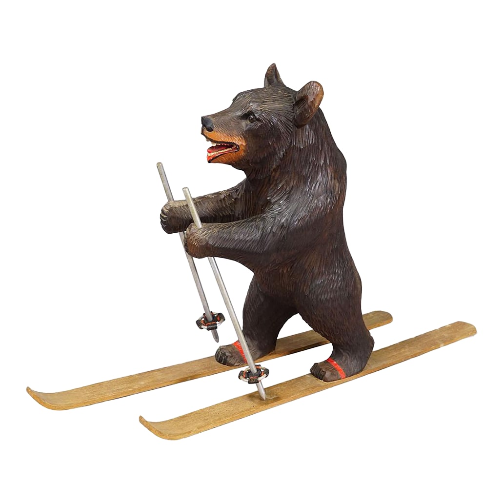 Antique Carved Black Forest Skiing Bear, Brienz Switzerland Ca. 1930: Antique Carved Black Forest Skiing Bear, Brienz Switzerland ca. 1930 Item e8145 A rare wooden carved sculpture featuring a skiing bear. Handcarved in lindenwood with naturalistic details in the area o