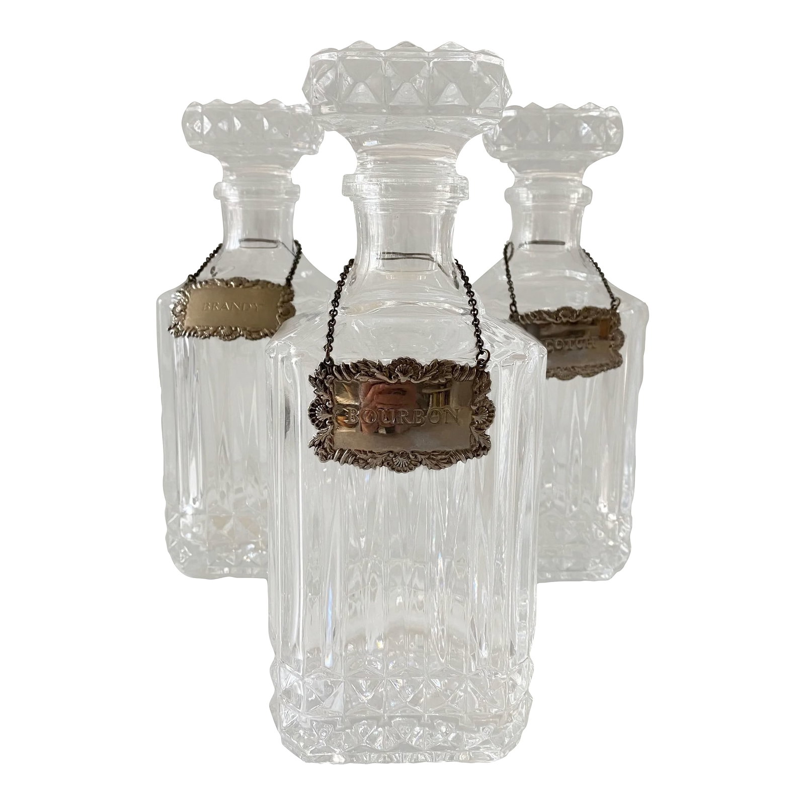 Vintage Sqaure Cut Crystal Glass Decanters With Diamond Point Pattern - Set of 3: Vintage 1960s cut crystal glass square shaped decanter set with diamond point pattern. Set is unmarked, but most likely by Cristal d'Arques. Decanters are heavy glass with solid glass stopper. Each