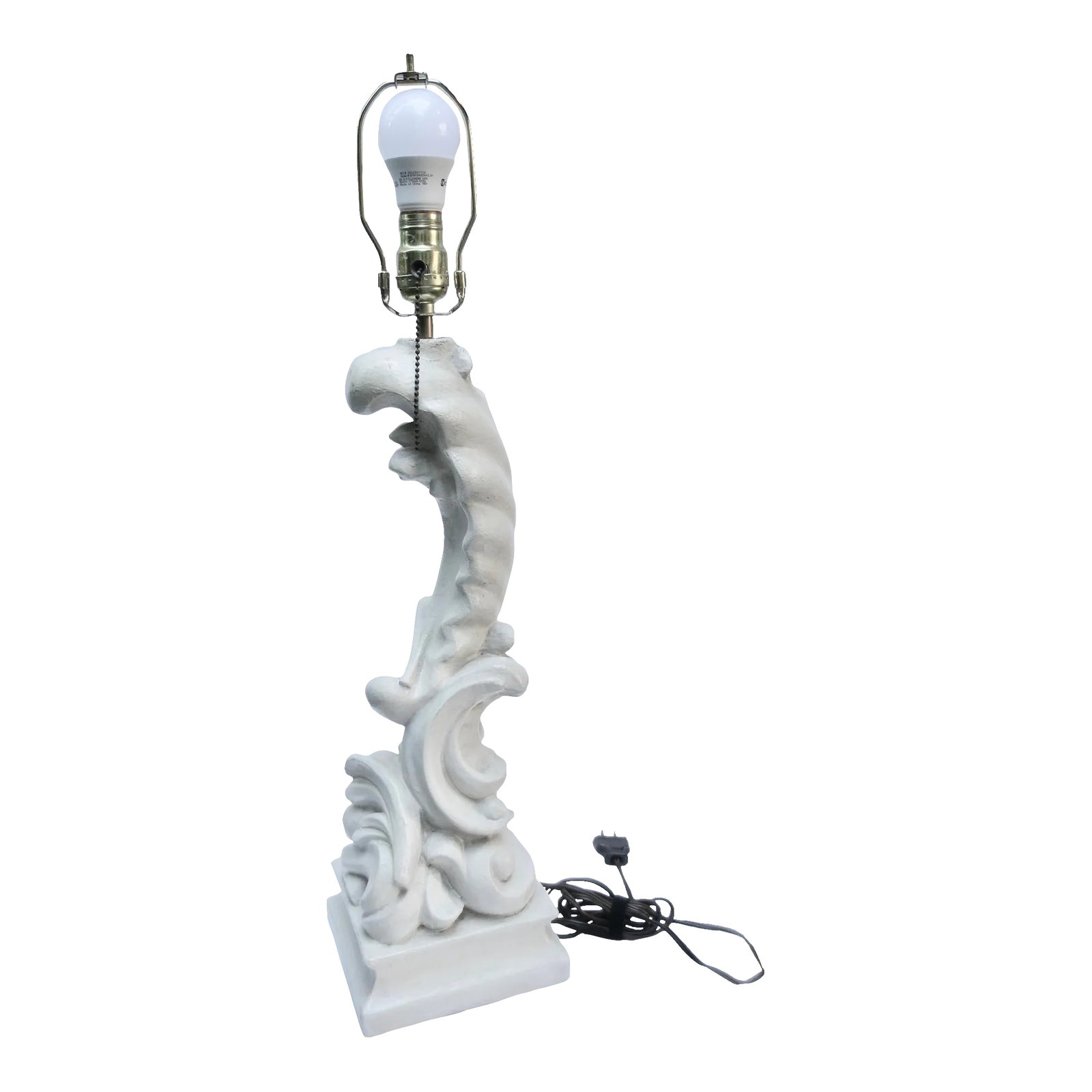 1940s French Solid Plaster Enameled Lamp: Carved in plaster with original white enameled oil finish. A vintage French plaster from the 1940s'. ( War Era) Now slight amber but with a great patina of the period. The electrical is renewed,
