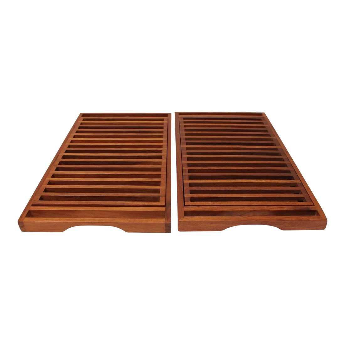Pair of Mid-Century Modern Teak Breadboards/Serving Trays by Selandia Designs: Pair of vintage teakwood breadboards/trays by Selandia Designs (Thailand, ca. 1960s). Composed of slatted, removable inserts for cutting bread within trays intended to catch crumbs. Trays can also be