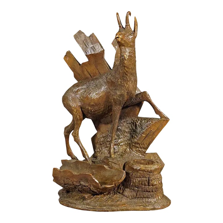 Finely Carved Wood Chamois Brienz, Switzerland Ca. 1900: Finely Carved Wood Chamois Brienz, Switzerland ca. 1900 A delicately handcarved wood sculpture of a chamois standing on a rocky base. A very detailed and natural carving excecuted by one of the Swiss