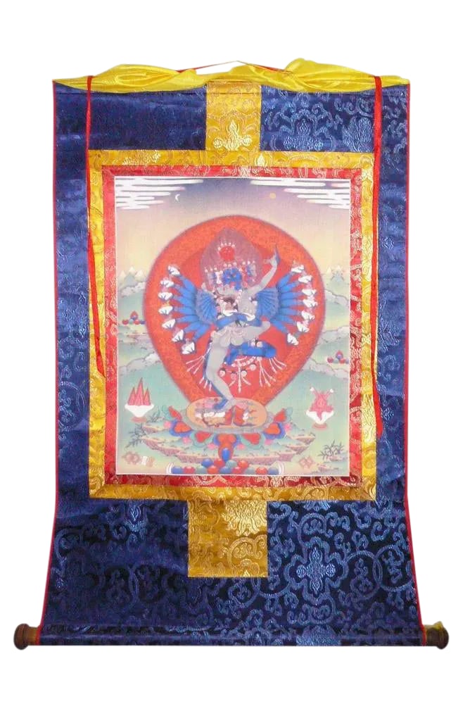 Tibetan Print Fabric Trim Deity Art Wall Scroll Thangka: This is a Tibetan Thangka which has a print graphic of Tibetan Buddha or Deity Art at the center and surrounded by colorful fabric. It is in a scroll style for easy storage and display. Dimensions: