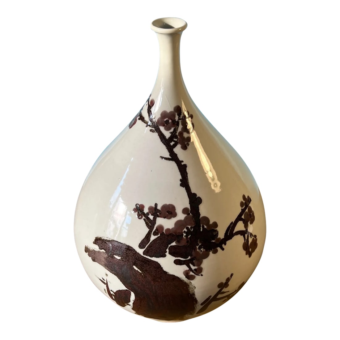 Large Vintage Chinese Porcelain Bottle Brown Plum Blossom Branch Motif: Transport yourself to the heart of ancient China with this large vintage Chinese white porcelain bottle vase. Adorned with a timeless brown plum blossom branch design, it boasts an elegant
