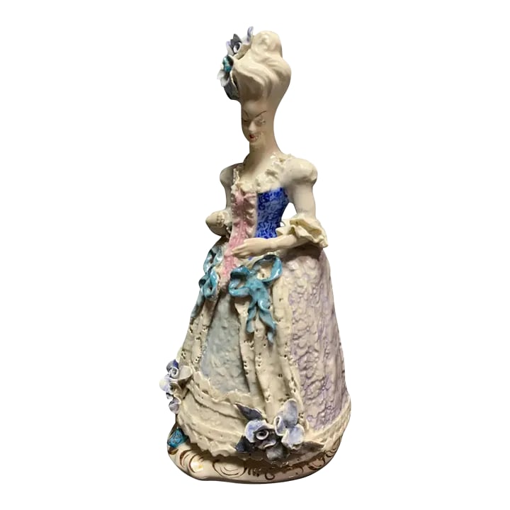Mid-Century Cybis 14 in Tall Porcelain Lay Figurine: The Cordey China Company, was founded in 1942 by the visionary Boleslaw Cybis. This exquisite figurine, standing at a majestic 14 inches, captures the essence of the Rococo period with its portrayal o