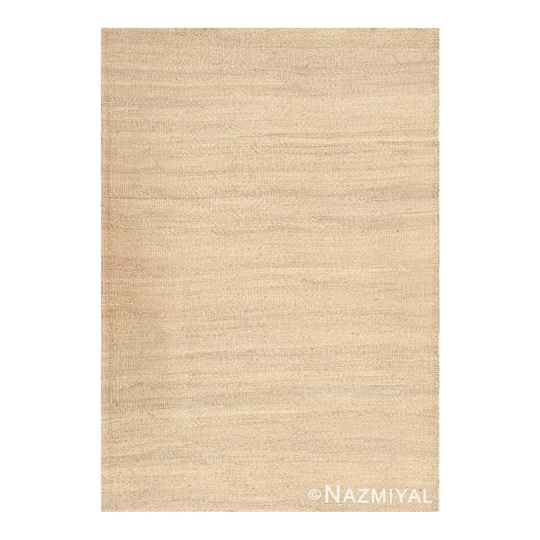 Nazmiyal Collection Vintage Solid Cream Color Moroccan Sisal Rug: Woven from sisal fibers, this chic vintage rug is a mid-century Moroccan carpet that has a stunning neutral facade with charming variegated textures and striated color variations. A Vintage Solid
