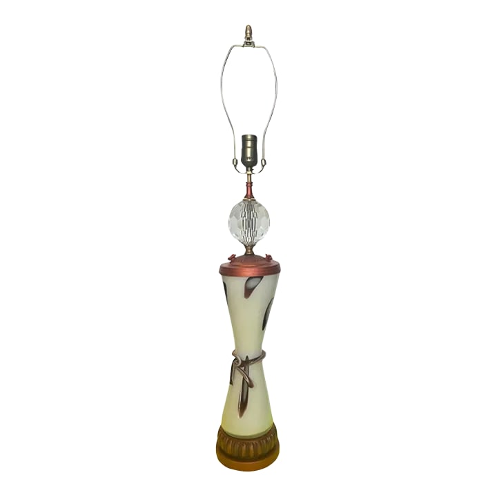 Art Glass Table Lamp: Milk Glass Mauve Oval Abstract Pattern: This exquisite table lamp is a stunning fusion of traditional craftsmanship and modern design aesthetics. The lamp's body is hand-blown from a delicate blend of milk glass and mauve glass, creating a