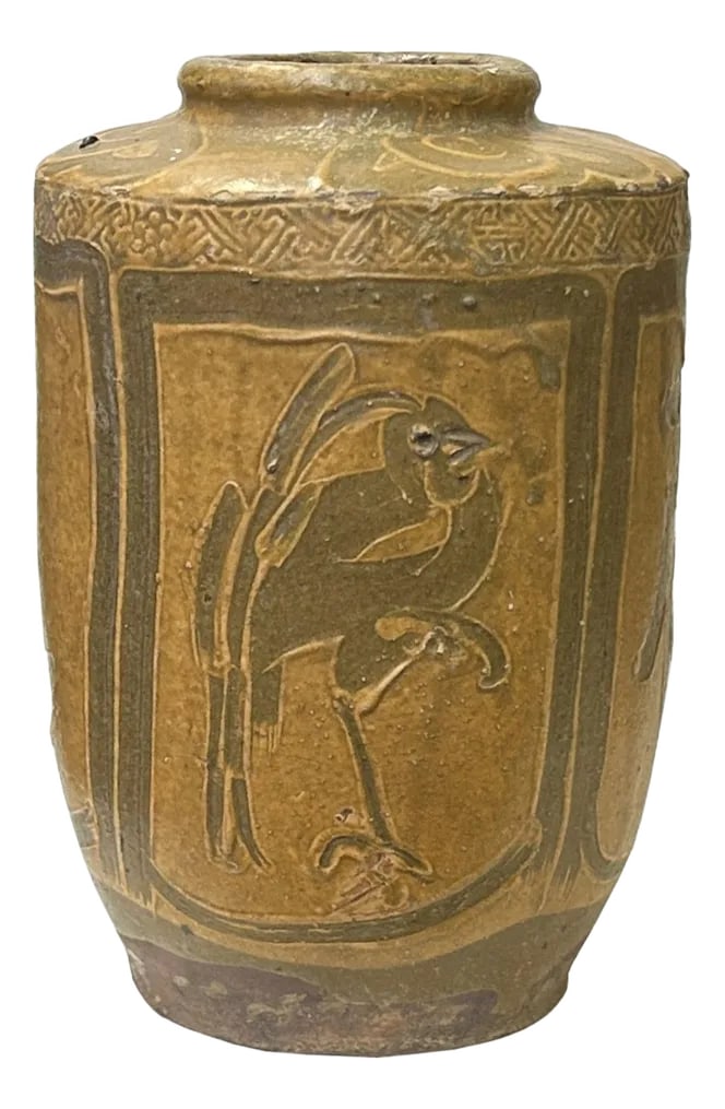 Vintage Earthy Beige Brown Village Rural Pottery Ceramic Pot Vase: This ancient ceramic jar exudes a rustic charm, its weathered surface telling tales of centuries past. The vessel, crafted from earthy pottery ware, features a rounded body that tapers slightly