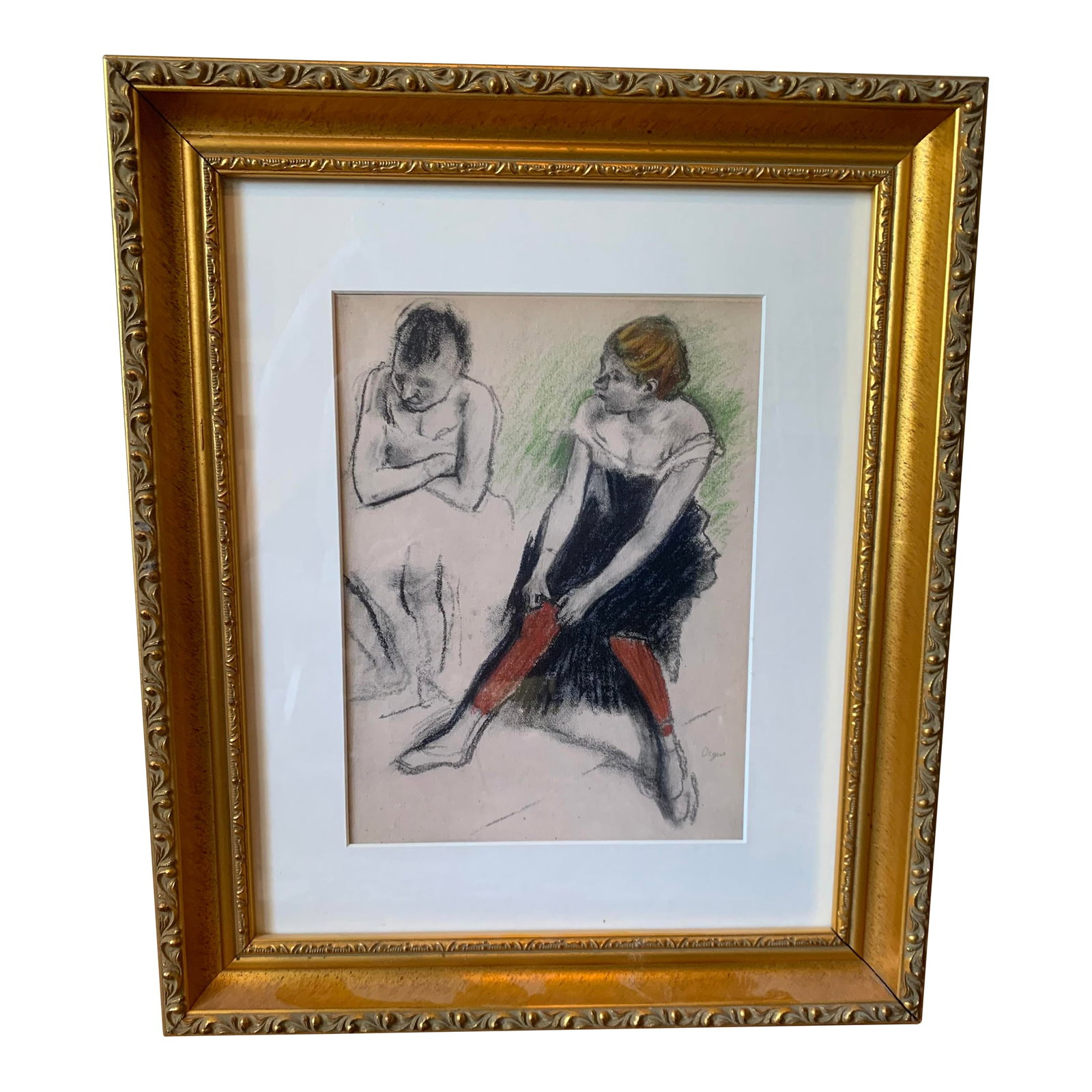 1950s Framed Print of Edgar Degas's "Danseuse Aux Bas Rouges": Framed print of Edgar Degas's "Dancer with red Stockings", a pastel drawing from around 1884. The artwork captures a candid moment of a dancer highlighting Degas's fascination with the world of
