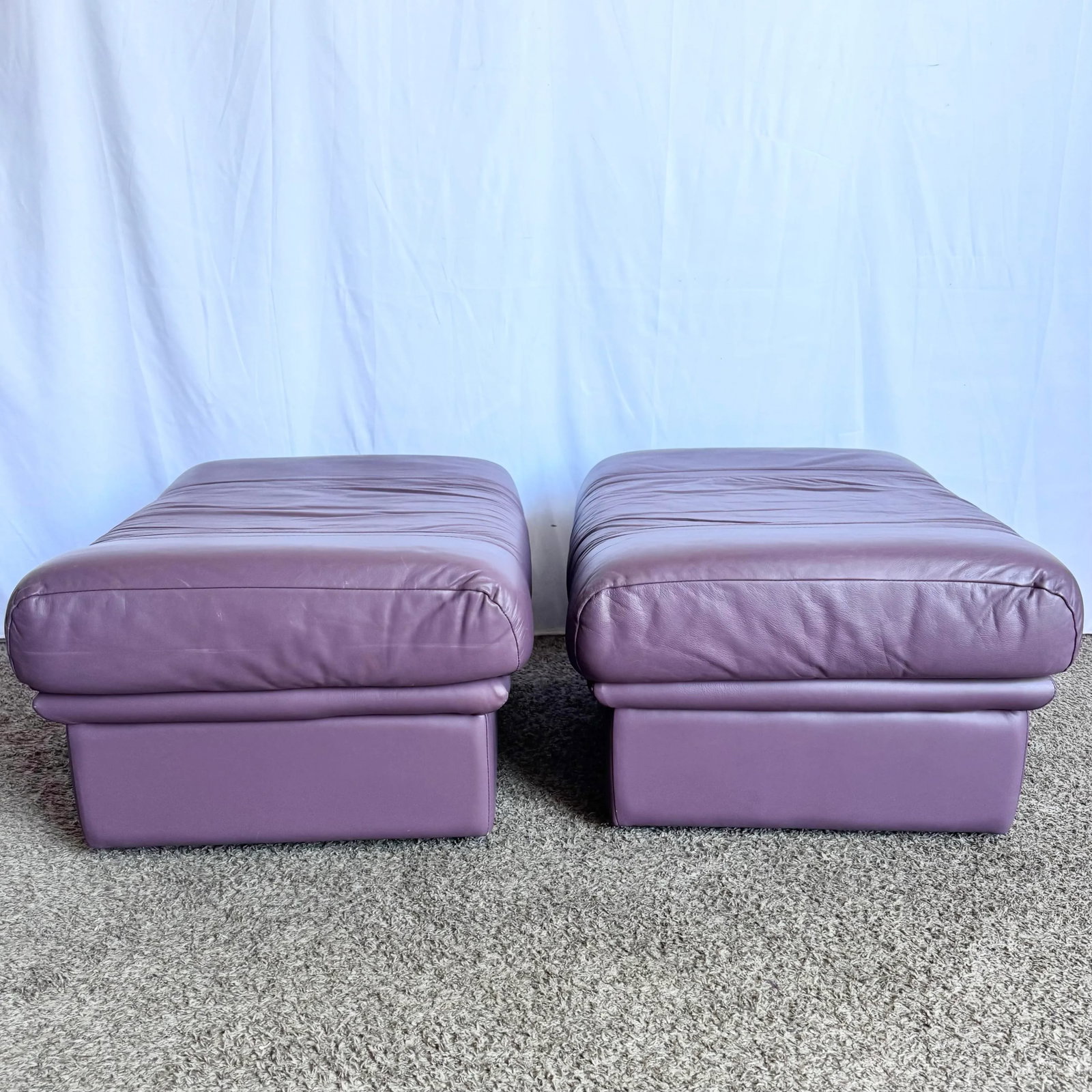 Vintage Italian Purple Leather Ottomans on Castors - A Pair - 4