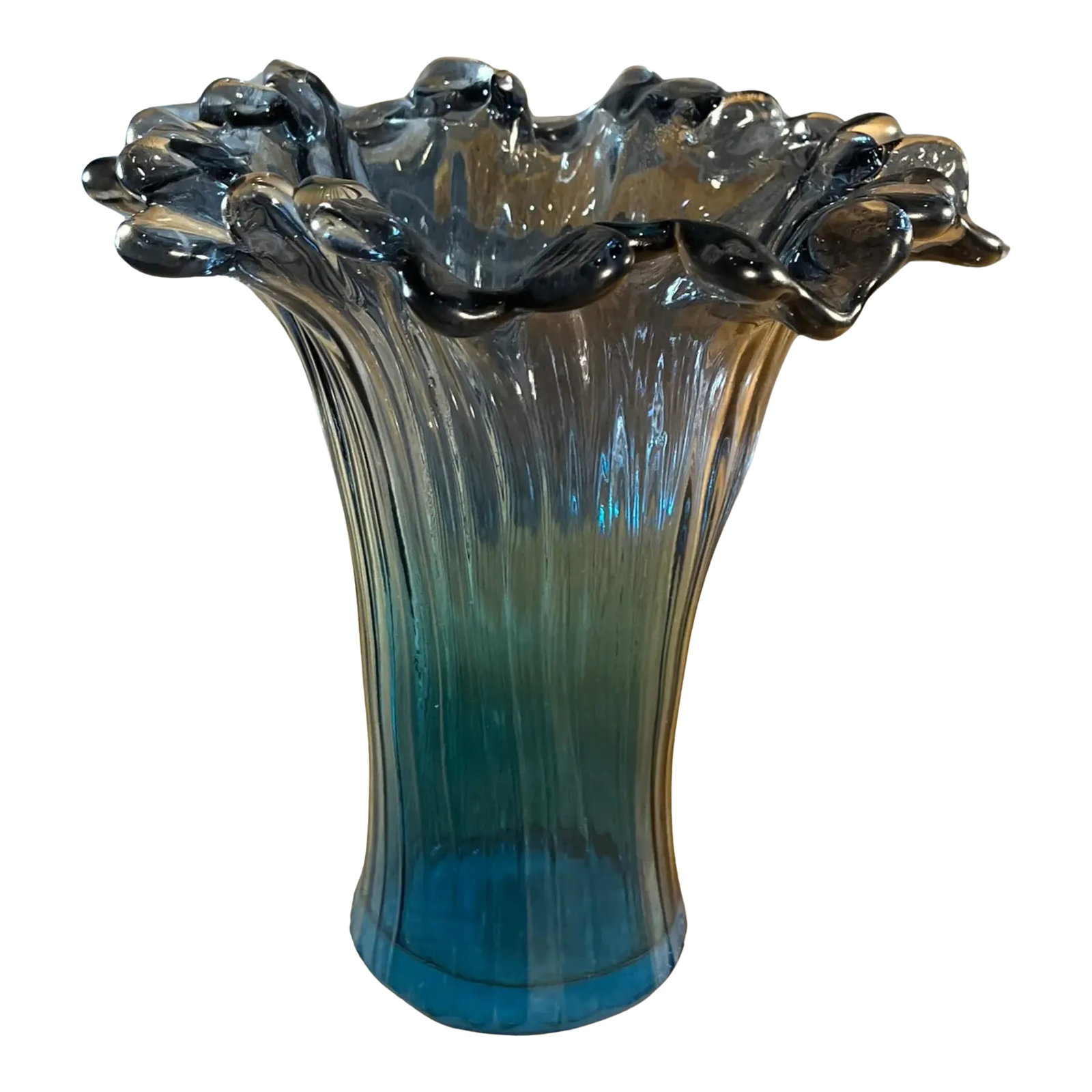 Murano Art Glass Teal Ribbed Trumpet Vase: This exquisite Murano hand-blown glass trumpet vase showcases a symphony of texture and form. Vertical fluted ridges trace their way from the rich teal base upward, casting fine shadows that lend