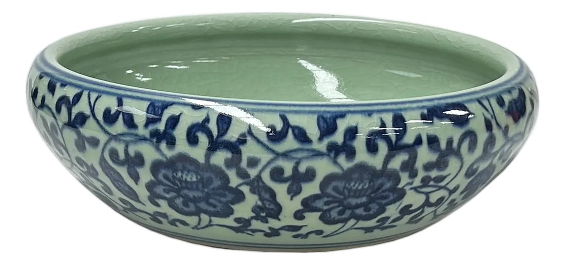 Chinese Celadon Blue Glaze Flower Porcelain Plate Bowl Display Art: Discover timeless elegance with this exquisite ceramic bowl, a true testament to masterful artistry. Adorned with a captivating blue floral motif that gracefully dances across a serene celadon green