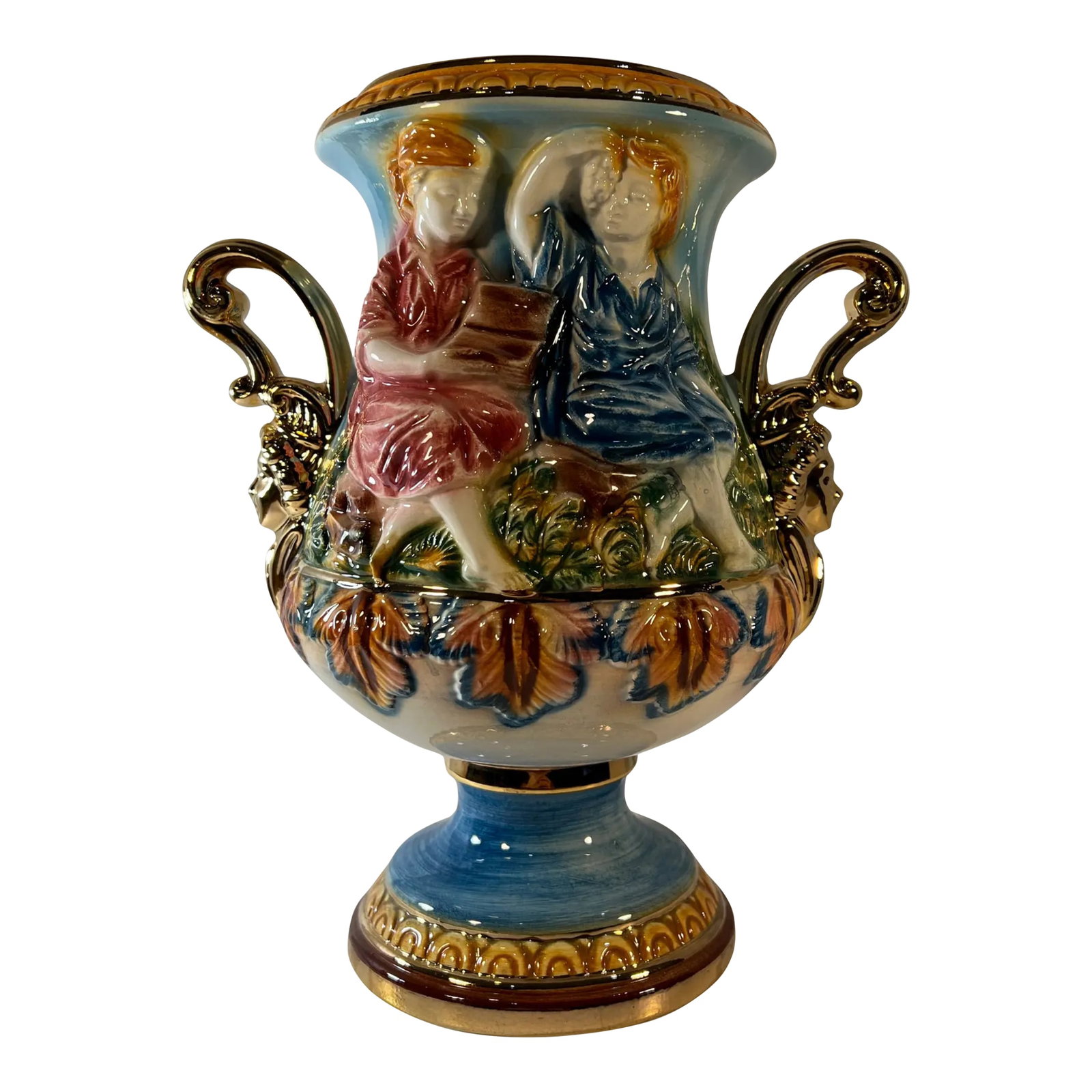 Capodimonte Porcelain Double Handled Urn Vase Boy and Girl: This 12-inch tall, exquisite Italian Capodimonte porcelain urn vase , is a true masterpiece of Italian craftsmanship. This urn showcases a finely crafted relief that transports you to a charming