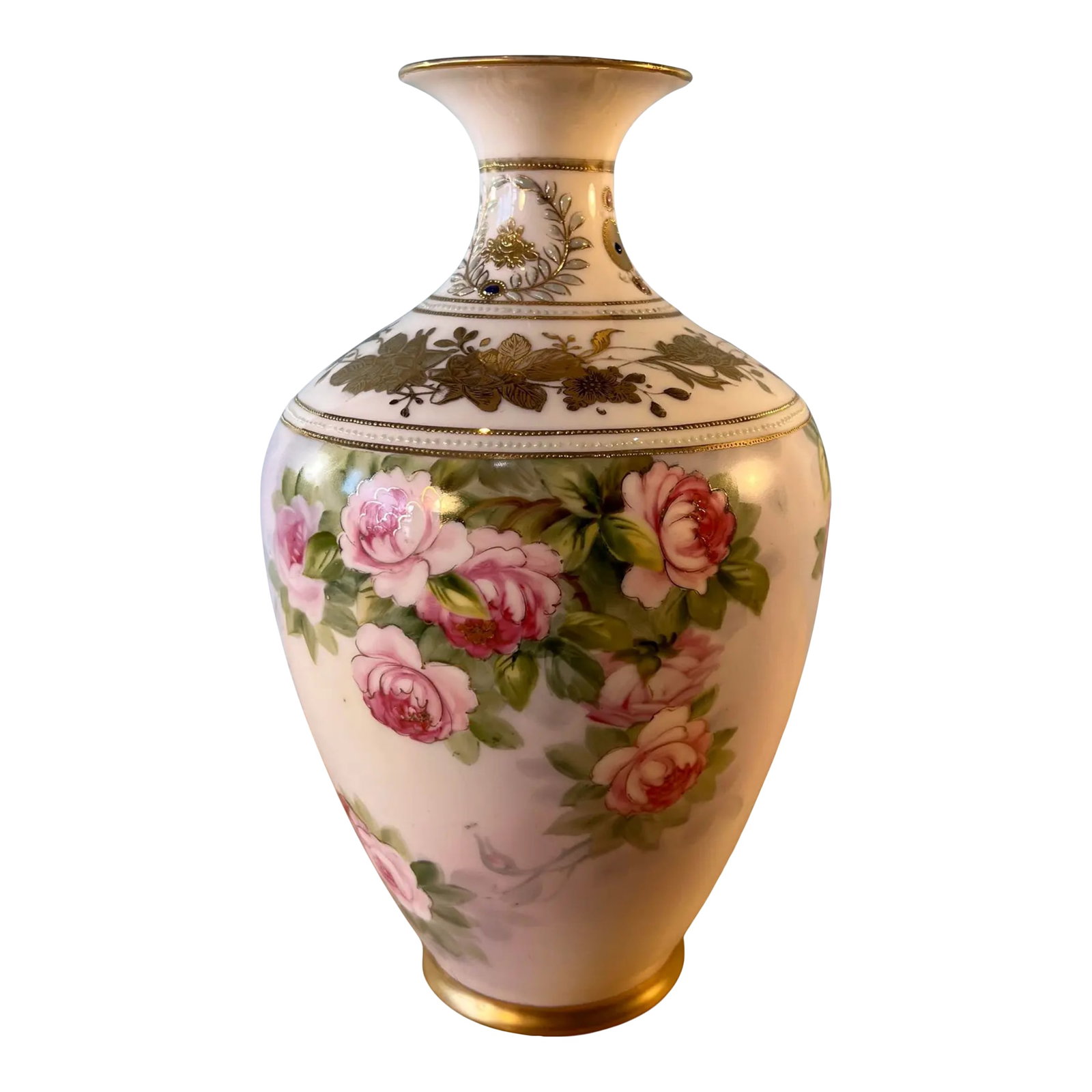 Antique Floral Porcelain Morimura Vase: The vase features a gracefully tiered silhouette, beginning with a wide, flared mouth that tapers into a slender, elegant neck before swelling into a full, rounded base. Its form is both balanced and