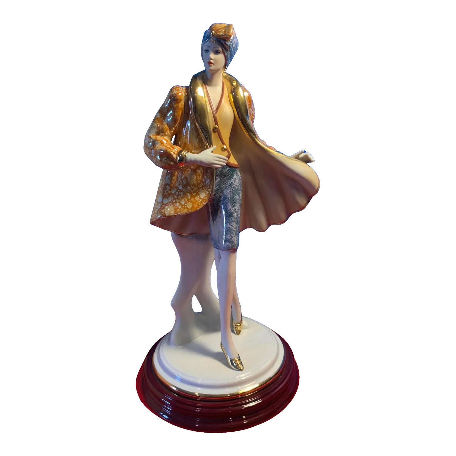 Capodimonte Porcelain by Germano Cortese Woman Modeling: This striking 16½- inch Capodimonte porcelain figurine by Germano Cortese captures the spirit and sophistication of the Art Deco era. It features a statuesque woman in a poised modeling stance,