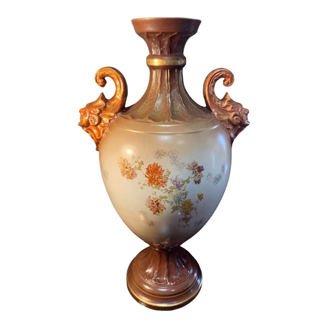 Antique Royal Worcester Style Floral Court Jester Mask Handles Porcelain Vase: This exquisite 16-inch-tall antique porcelain vase exudes the opulence and refined artistry reminiscent of a Royal Worcester piece. The vase's bulbous body, gracefully swelling at its center, is