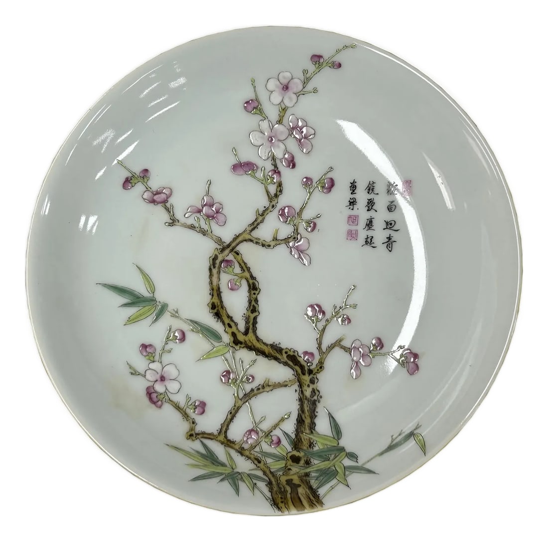 Chinese Pink Blossom Flower White Porcelain Plate Display Art: Elevate your collection with this magnificent Chinese porcelain charger plate, a rare and captivating artifact from the illustrious Qianlong period (1736-1795). This exceptional plate embodies the pin