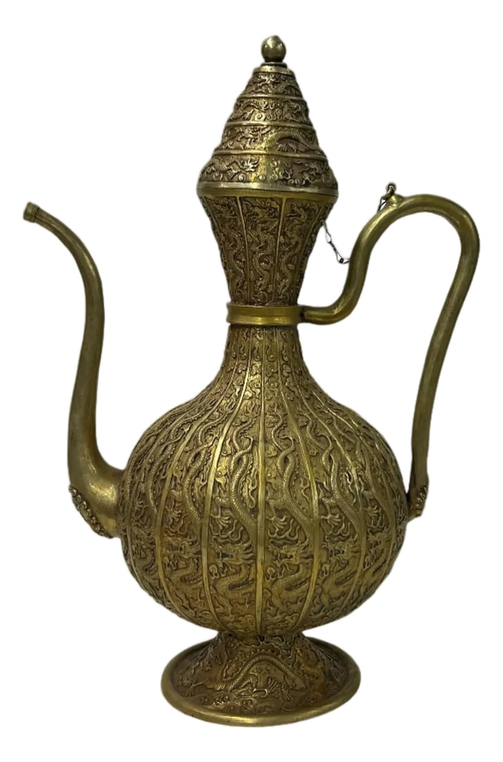 Handmade Artistic Brass Metal Color Wine Jar Shape Display Figure: This antique-inspired ewer, crafted from ornate brass, is a stunning testament to historical design and masterful craftsmanship. Adorned with intricate, flowing patterns and stylized dragon motifs,