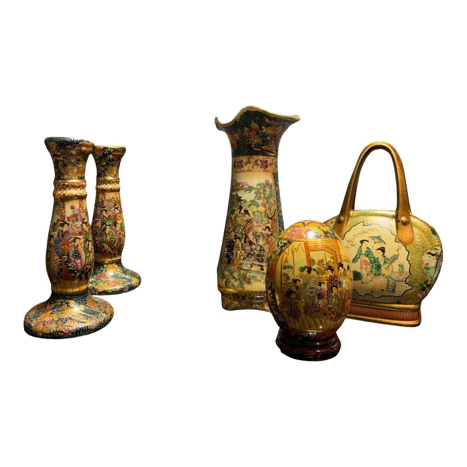 Satsuma Ceramic Vase and Candle Holders, Orb and Purse Vase - A Set: The 14-inch Satsuma ceramic vase is a striking example of Meiji-era Japanese craftsmanship, commanding attention with its flared rim and densely detailed imagery. Two women ride astride—rather t