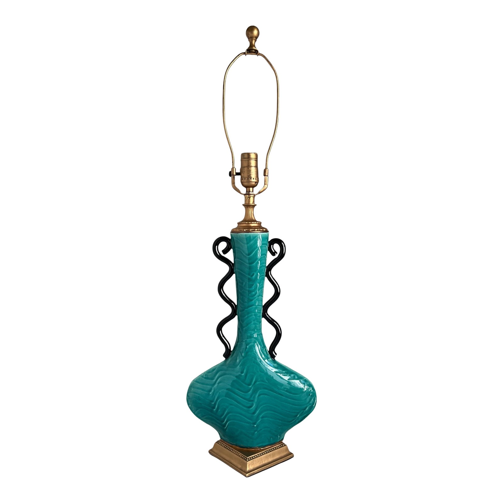 Mid-Century Ceramic Teal Black Curvy Table Lamp: This ceramic table lamp is a bold and sculptural piece that combines midcentury flair with vintage craftsmanship. The body is formed from turquoise-glazed ceramic, shaped into a dramatic silhouette