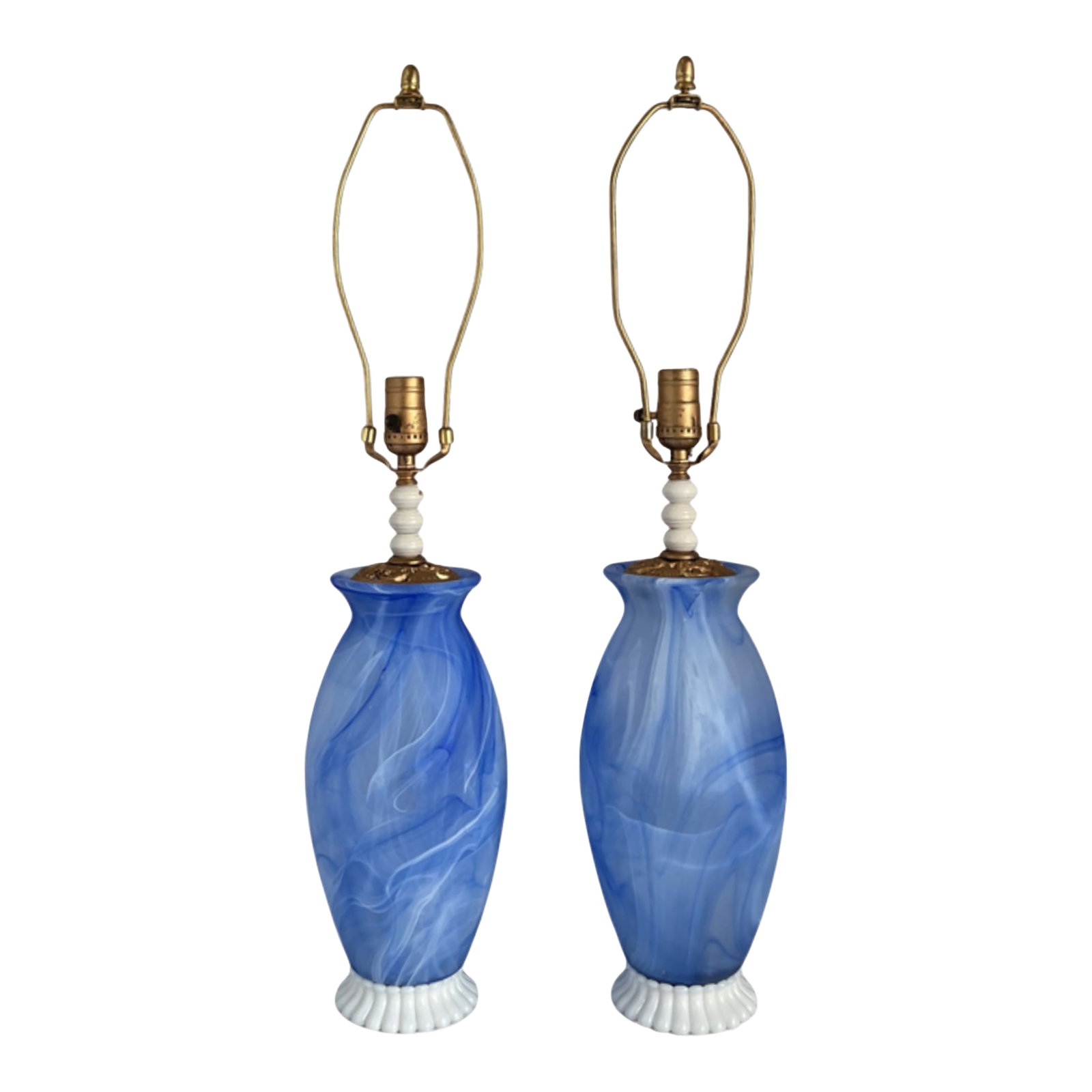 Art Glass Vetreria Swirl Frosted Blue Milk Glass Table Lamps- A Pair: This pair of hand-blown Vetreria Italian art glass lamps showcases a graceful blend of frosted texture, swirling color, and vintage detailing. Each lamp features a vase-like body formed from transluce